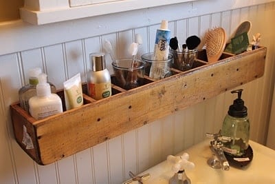 a cheap cd tower turned on its side makes for a great bathroom organizer.