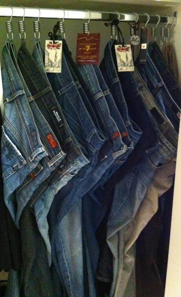 Hang your jeans on shower hooks to make them more assessable.