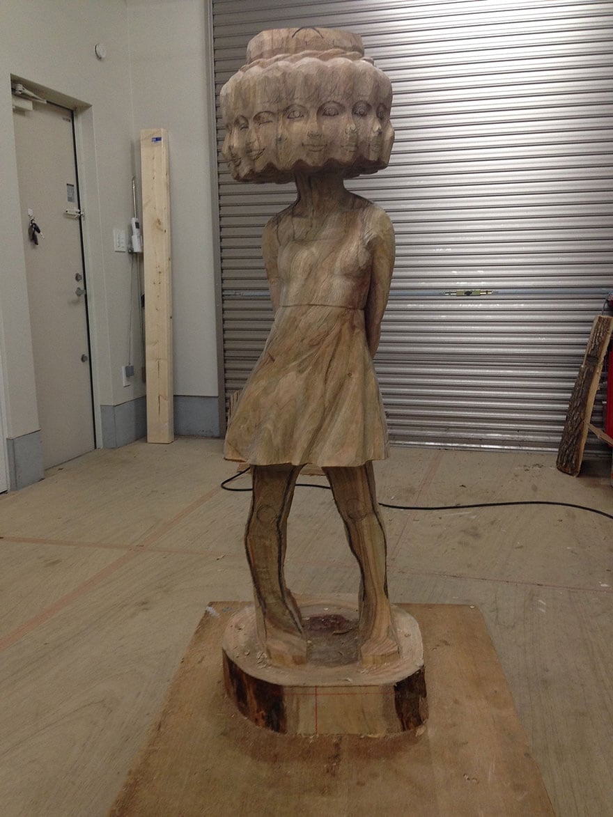 wood-sculptures-of-bizarrely-twisted-characters-by-a-surreal-japanese-artist-7