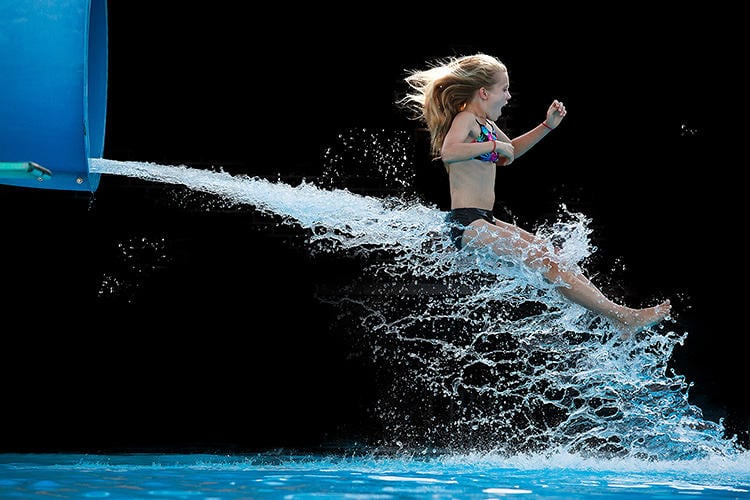 10 Perfectly Timed Photos Of People Shooting Out Of Waterslides 3033400-slide-s-waterslide-02