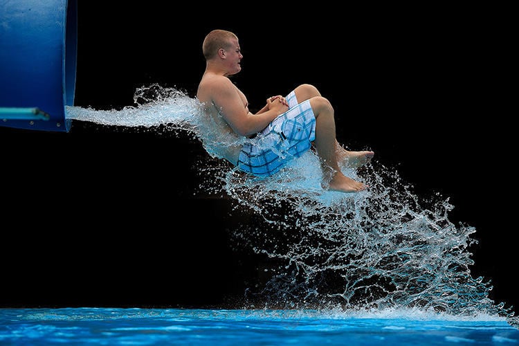 10 Perfectly Timed Photos Of People Shooting Out Of Waterslides 3033400-slide-s-waterslide-06