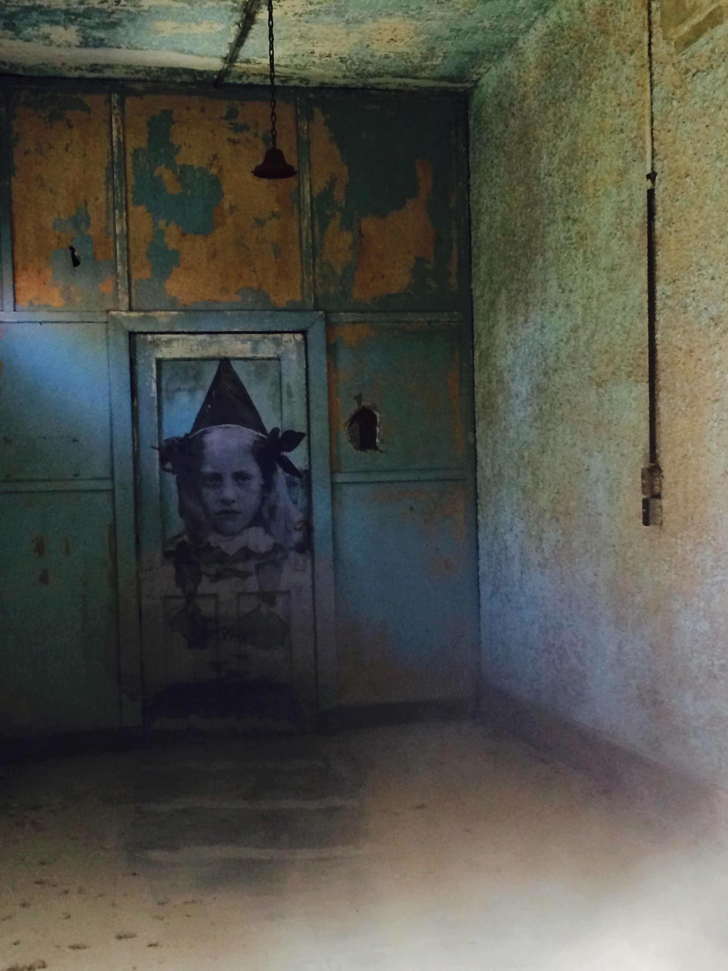 Haunting Photo Exhibition In Abandoned Ellis Island Hospital by JR juxtapozjrellis24