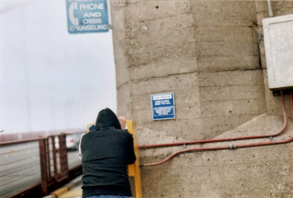 Man uses the suicide hotline on the Golden Gate Bridge.