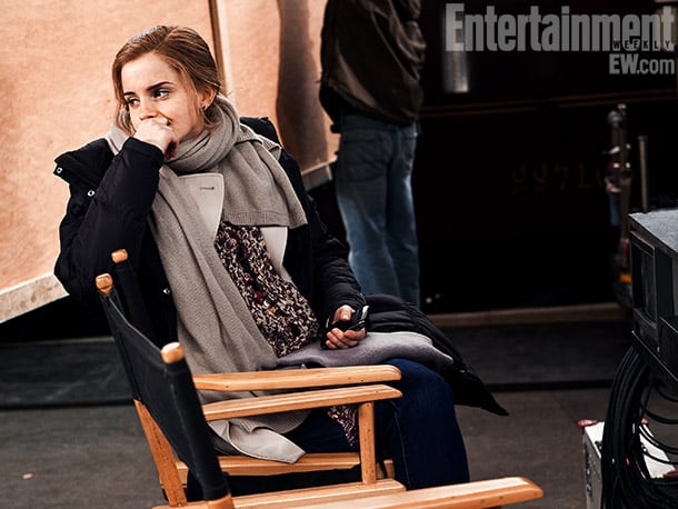 Harry Potter: 19 Amazing Behind-The-Scenes From the Entire Series Emma Watson on set at King's Cross Platform, Harry Potter and the Deathly Hallows — Part 2 (2011) Image Credit: Linus Lucas