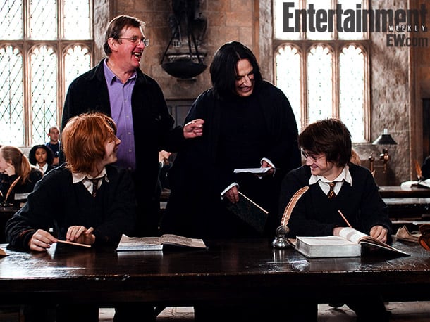 Harry Potter: 19 Amazing Behind-The-Scenes From the Entire Series Grint, Newell, Alan Rickman, and Radcliffe, Harry Potter and the Goblet of Fire (2005) Image Credit: Murray Close