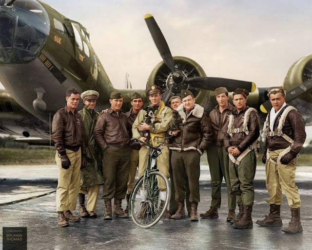 US Air Force pilot 2nd Lieutenant Robert Wade Biesecker with his crew of the 569th Bombardment Squadron, 390th Bomb Group, US Eighth Air Force, standing by 'Honey Chile', their B-17 Flying Fortress bomber (serial 42-31027), at RAF Framlingham, a US Eighth Air Force Bomber Command station in England, 18 October 1943. (Photographer: M. McNeil, for Fox Photos. Images courtesy of the Hulton Archive/ Getty Images. Colorized and researched by Benjamin Thomas from Australia)