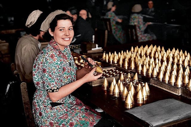 Girls working on shell caps in a munitions factory, somewhere in England. 25th of May 1940. (Source - Gettys Images - Photographer, Paul Popper. Colorized by John Gulizia from America)