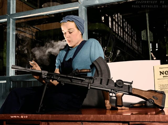 Veronica Foster, (b.1922 - d.2000) popularly known as "Ronnie, the Bren Gun Girl", was a Canadian icon representing nearly one million Canadian women who worked in the manufacturing plants that produced munitions and materiel during World War II. Colorized by Paul Reynolds. Historic Military Photo Colourisations)