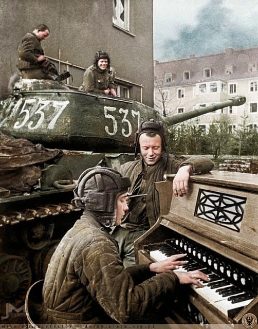 These 50 Astonishing WWII Colorized Photos Look Like They were Taken Yesterday crew members of nº537 soviet is-2 tank of the 87th guards heavy tank regiment take a break in breslau (now wrocław in poland) 27th april 1945. (photographer - anatoli egorov. colorized by jiří macháček from the czech republic)