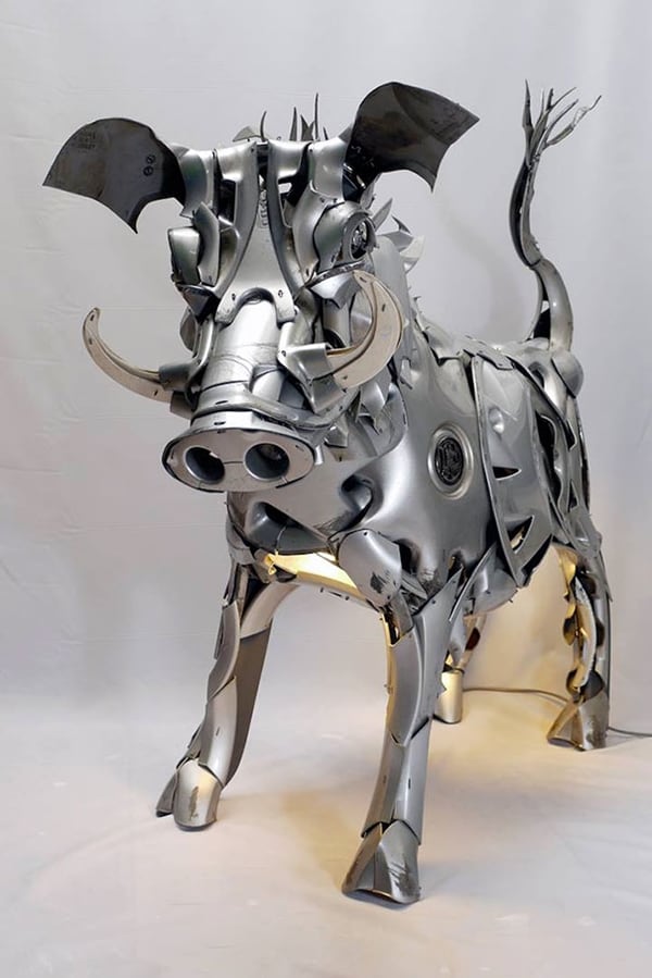 hubcap-sculpture-warthog
