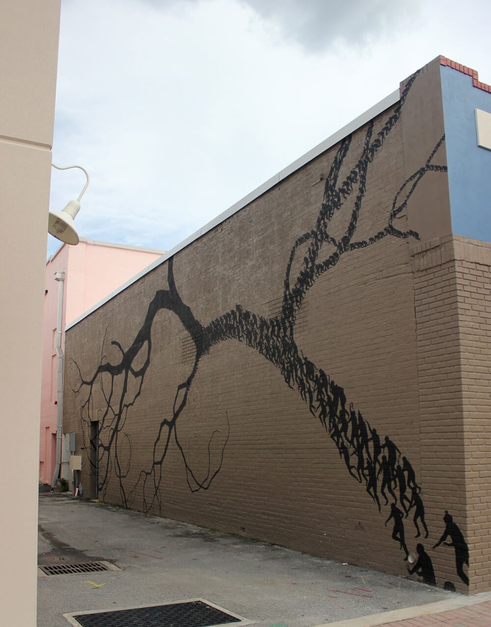 Street Artists Create Huge Murals from Silhouetted Figures 03