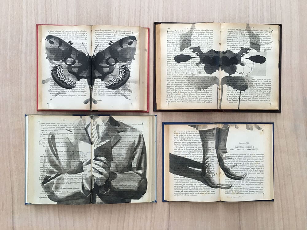 This Artist Creates Ink Paintings on Arrays of Vintage Books