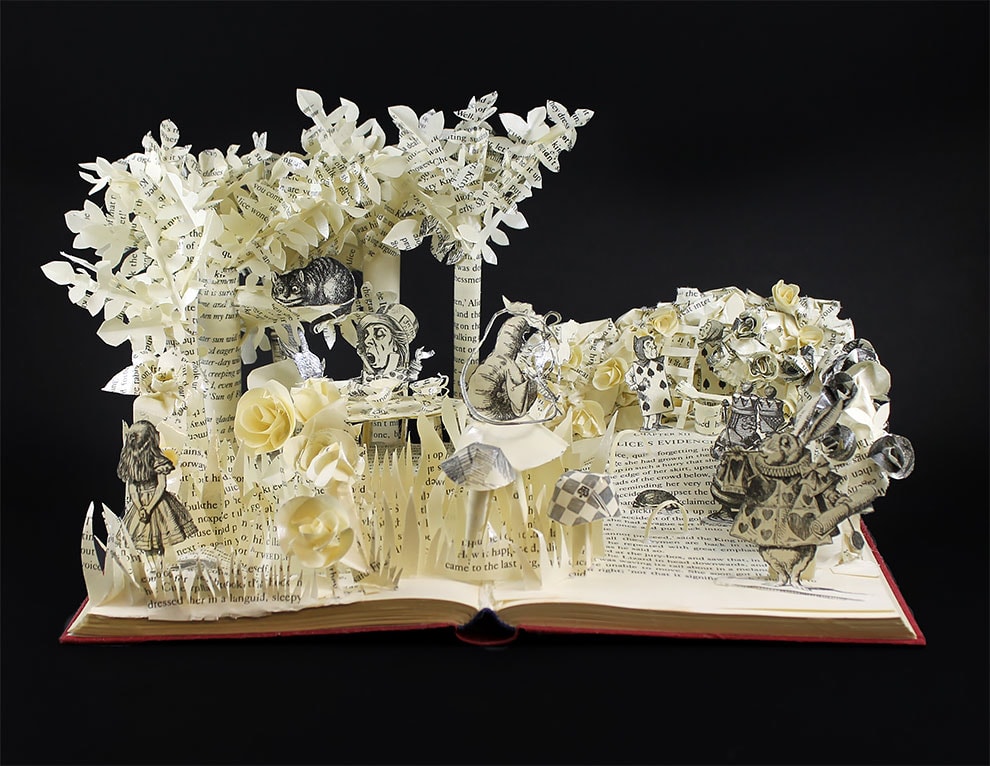 Jamie Hannigan Creates Intricate Paper Sculptures Only Using The Pages 