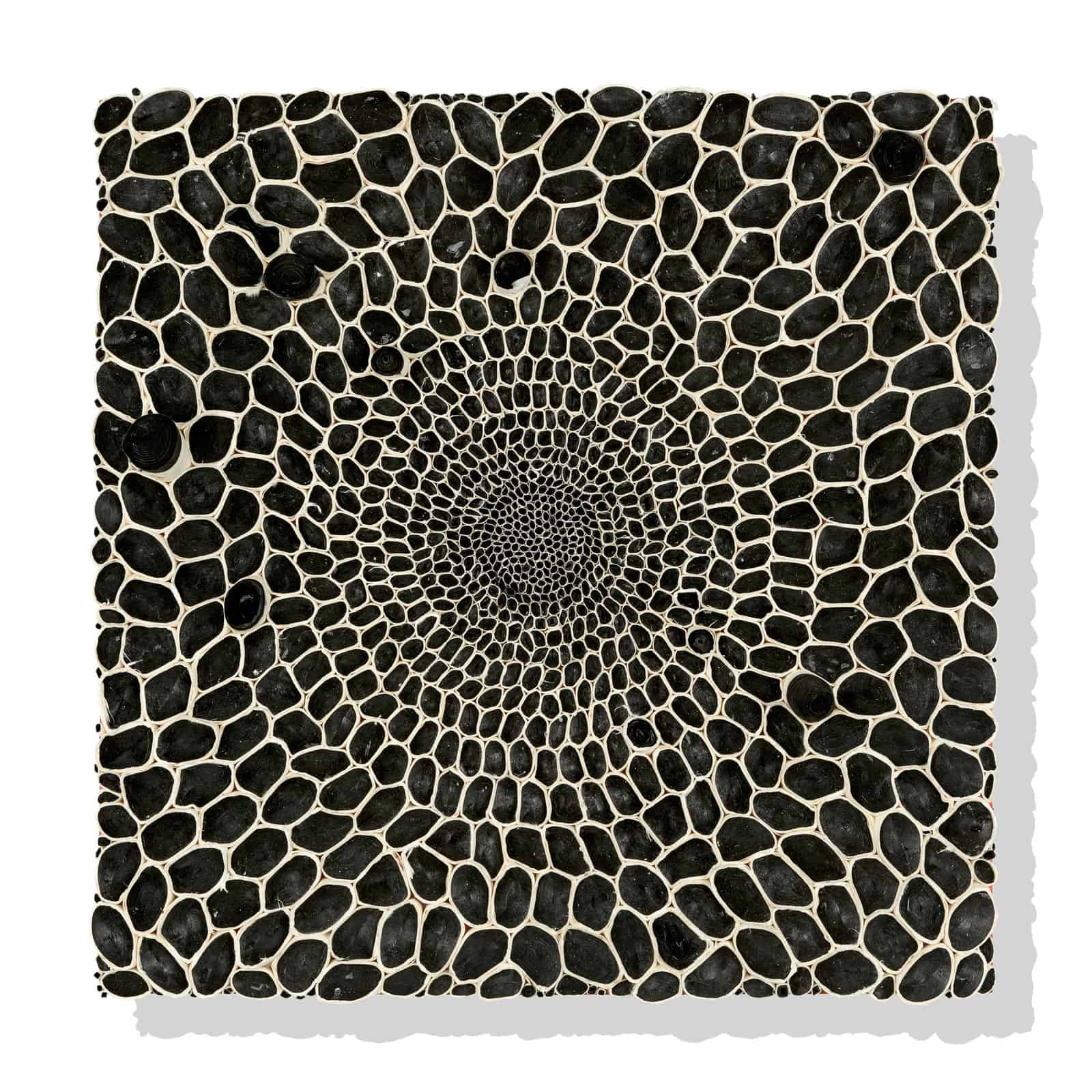 An Artist Uses Rolled Paper To Create Intricate Structures