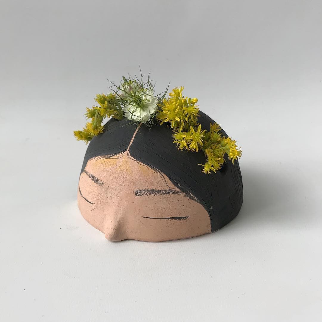 Serene Ceramic Women Resemble Peace And Love That Artist Has Found In Herself