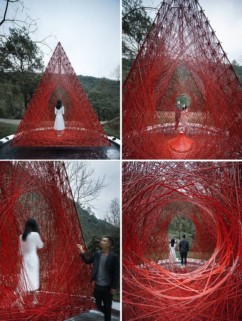 Interesting Red Triangle Installation That Is Made From A Woven Carbon