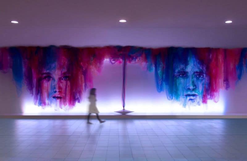 Artist Benjamin Shine creates huge calm faces from tulle fabric