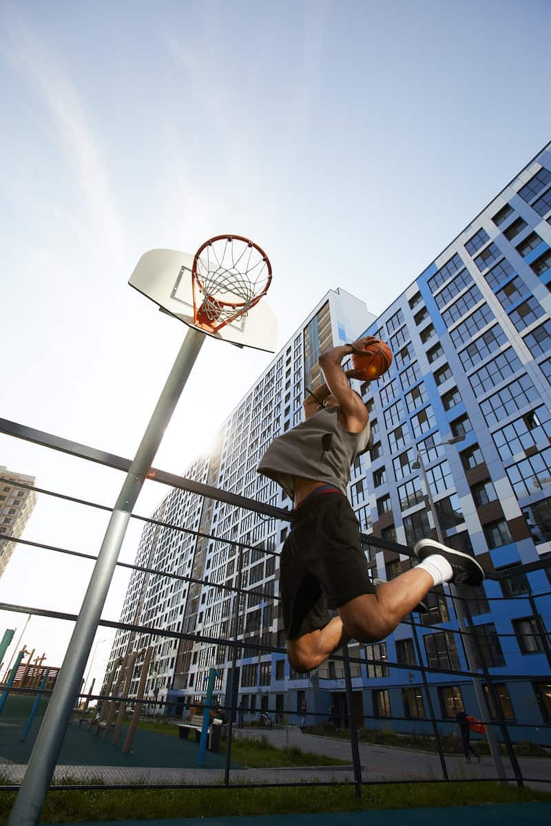 basketball player jumping action shot SFK8ULN