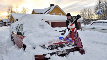 nominated brother and sister cleaning a car from snow in the north of sweden snow car cold winter t20 ywzBwR scaled