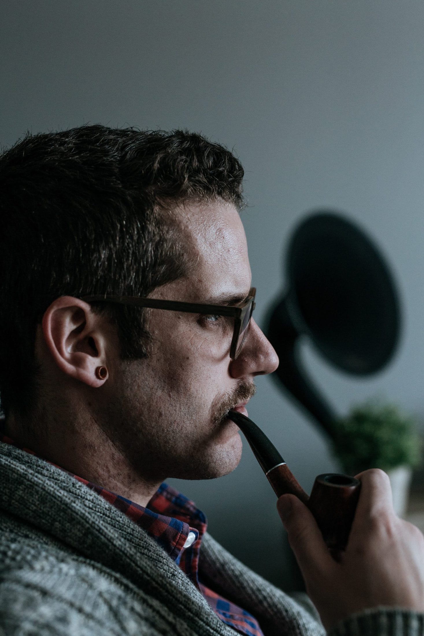 Getting Better – Mental Flow And Its Many Benefits man holding tobacco pipe
