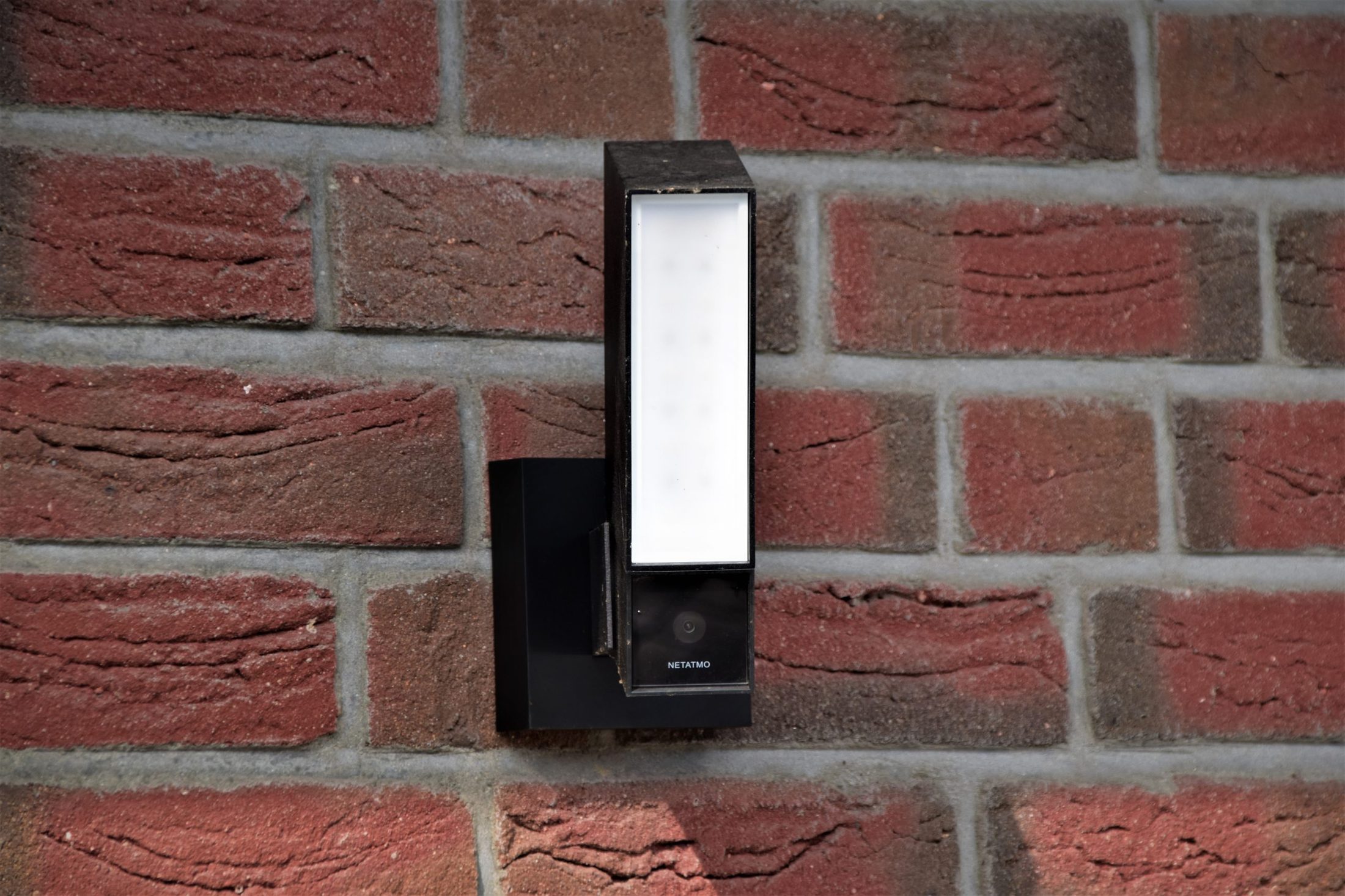 Home Security Meets Interior Design black and white wall mounted device