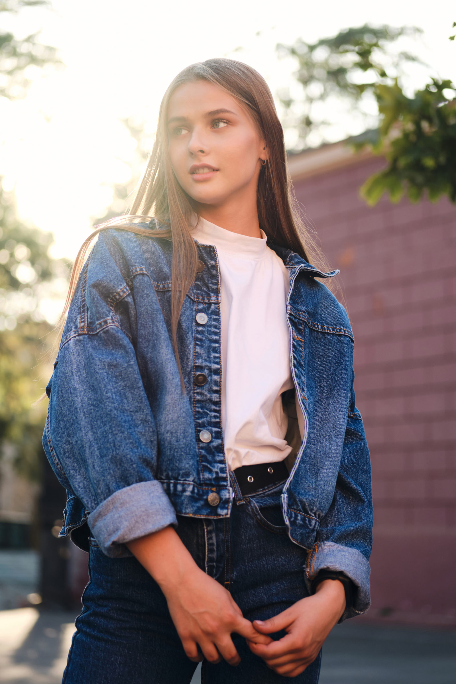 beautiful serious casual girl in denim jacket conf A9UG3BZ