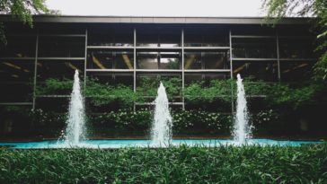 fountain and glass building