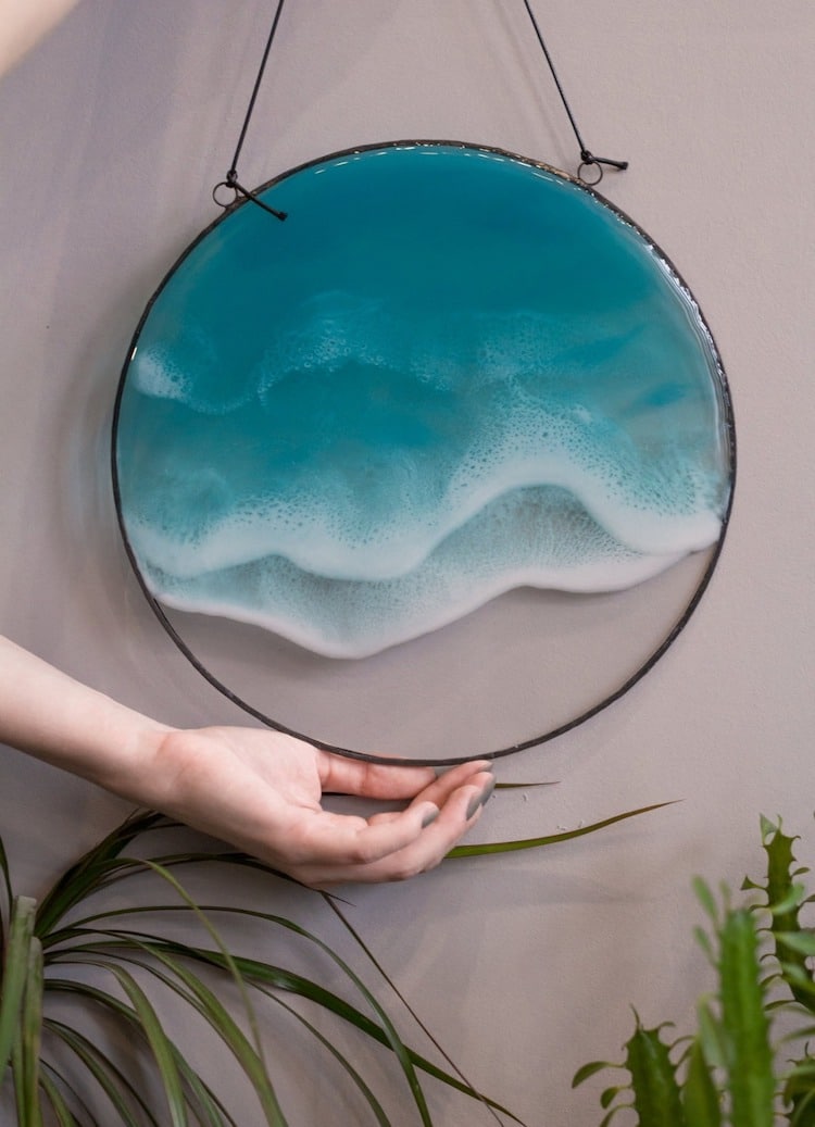 Pendants and swirling resin wall hangings capture the beauty of crashing waves