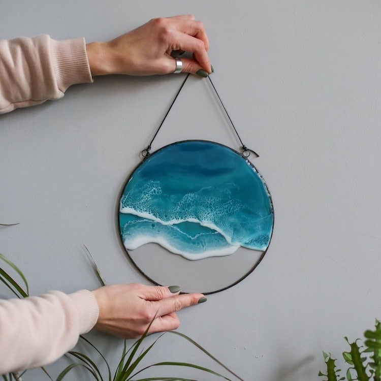 Pendants and swirling resin wall hangings capture the beauty of crashing waves