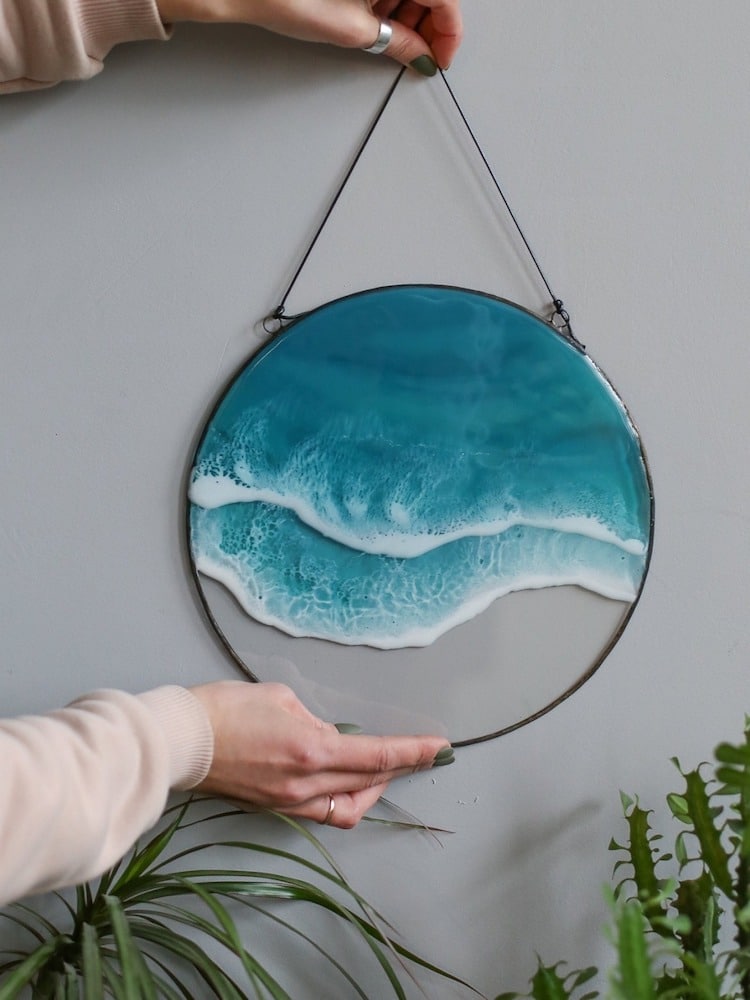 Pendants and swirling resin wall hangings capture the beauty of crashing waves