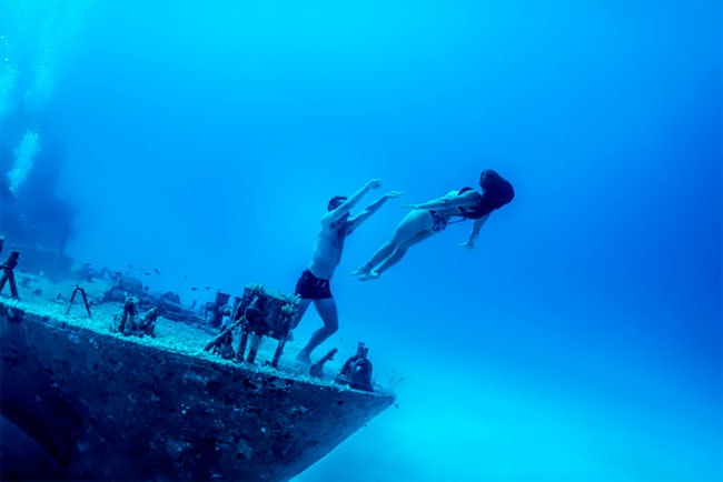 Series of "Underwater Playground" photos with professional freedivers
