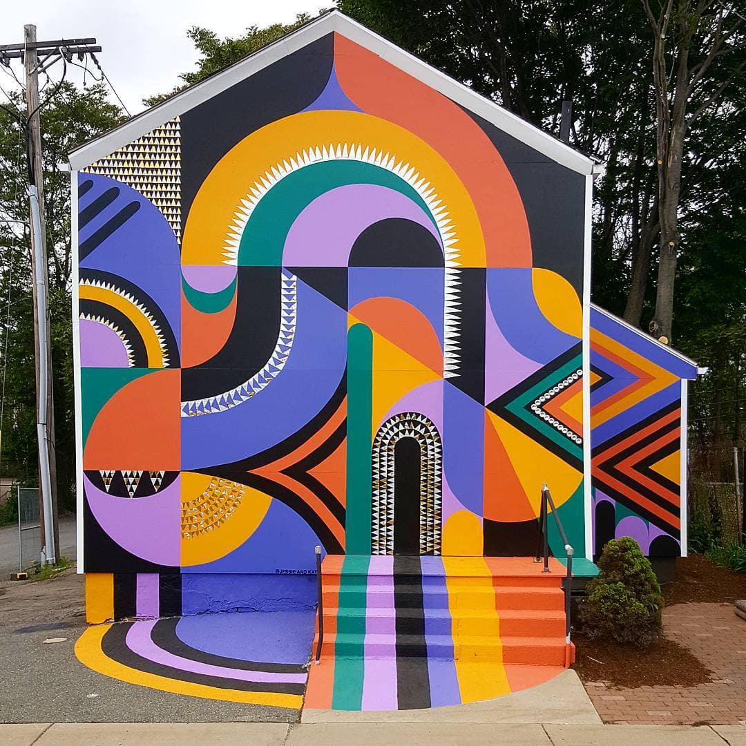 Artists Jessie and Katey bring life and colors into an old and boring structure