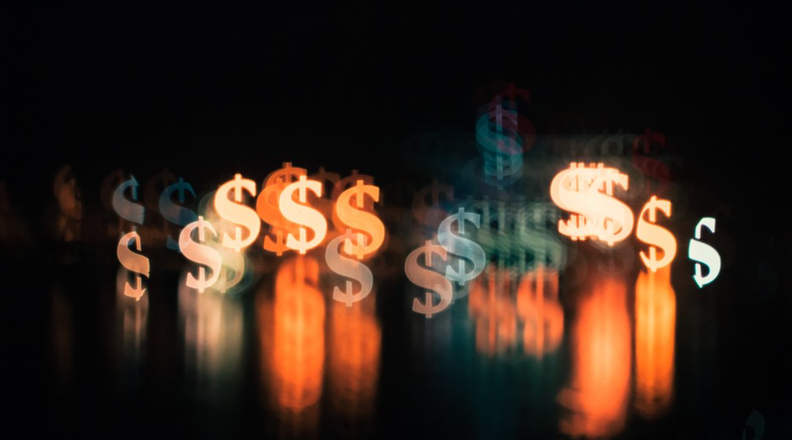 Investment white and orange bokeh lights