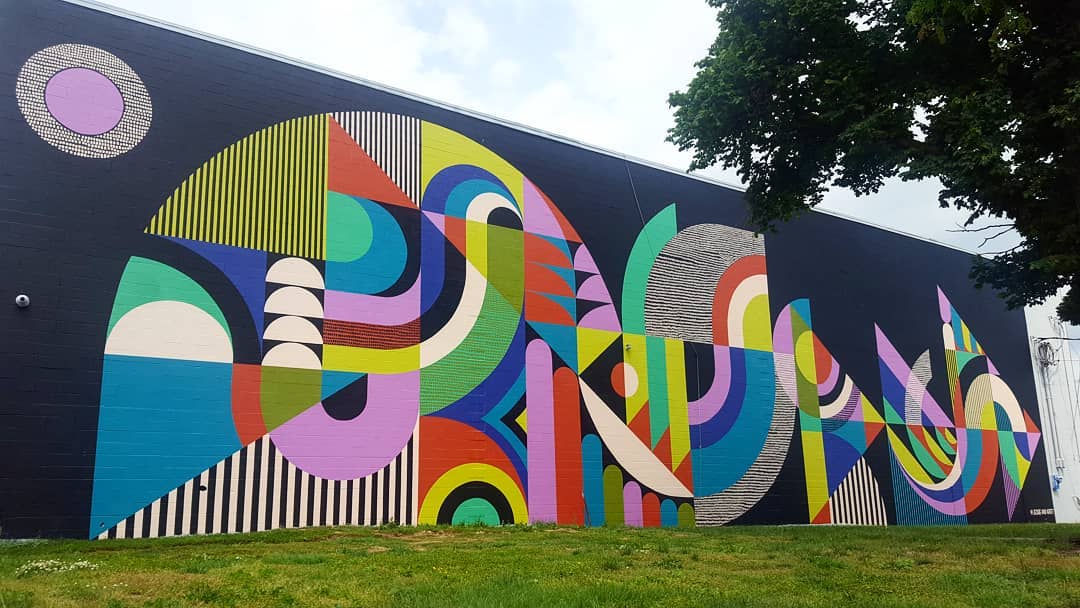 Artists Jessie and Katey bring life and colors into an old and boring structure