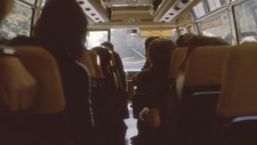 people sitting while riding bus