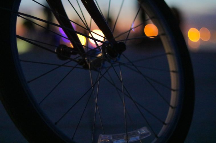 shallow focus photography of bicycle wheel