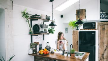 woman sitting in front of table