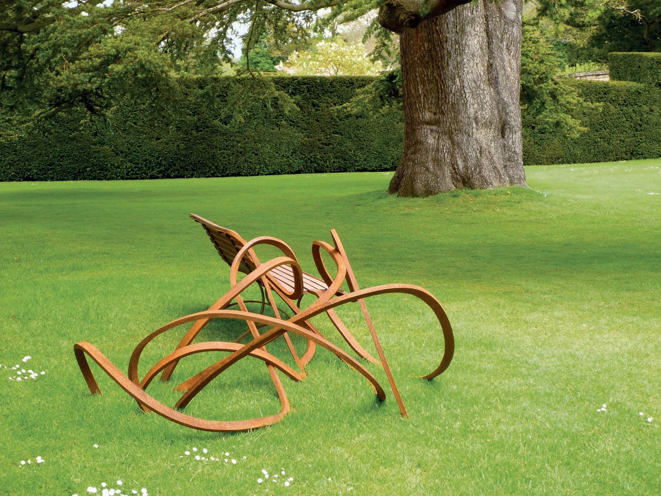 Pablo Reinoso’s wooden benches unfurl like a real spaghetti