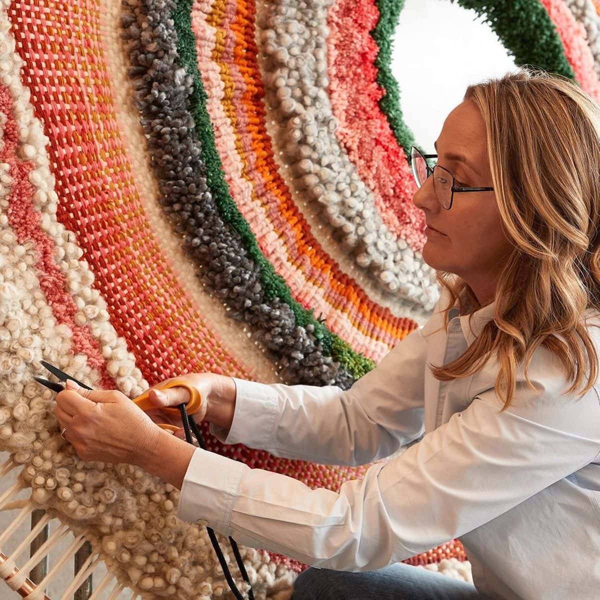 Artist Tammy Kanat creates large-scale woven wall hangings full of colors