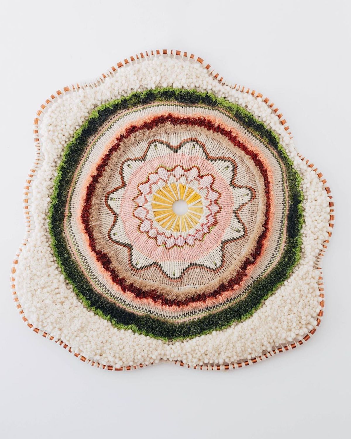 Artist Tammy Kanat creates large-scale woven wall hangings full of colors