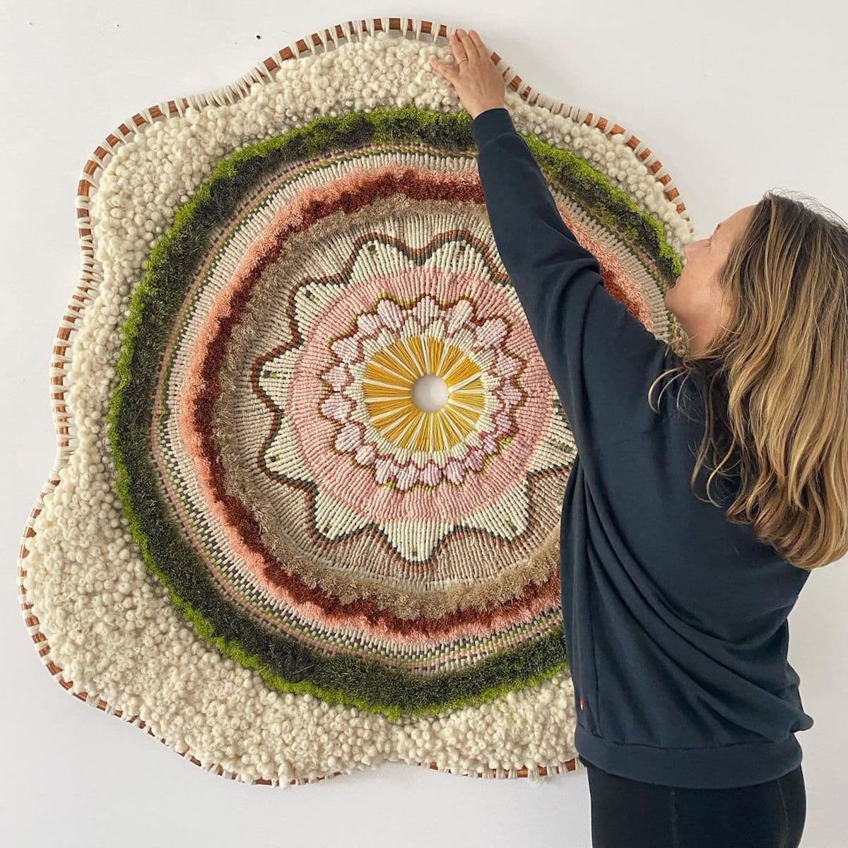 Artist Tammy Kanat creates large-scale woven wall hangings full of colors