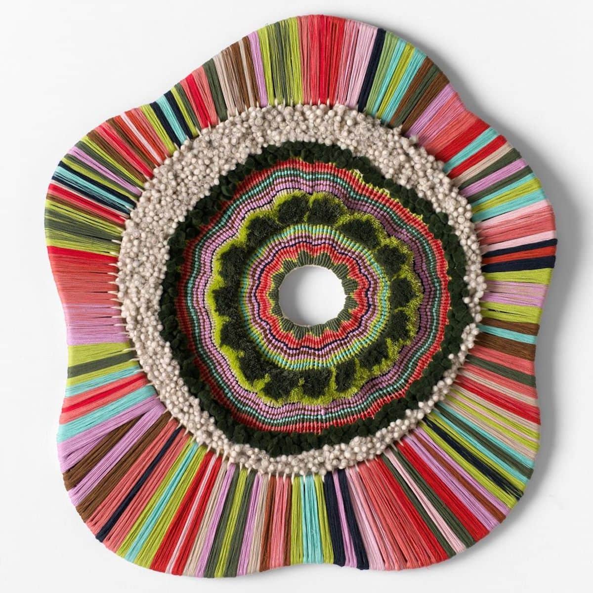 Artist Tammy Kanat creates large-scale woven wall hangings full of colors