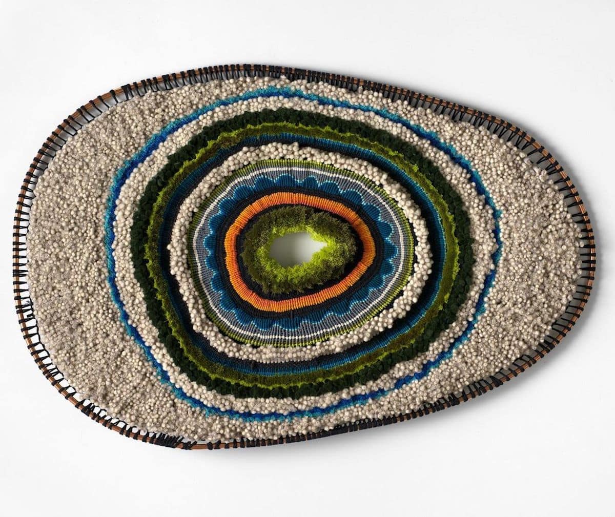 Artist Tammy Kanat creates large-scale woven wall hangings full of colors