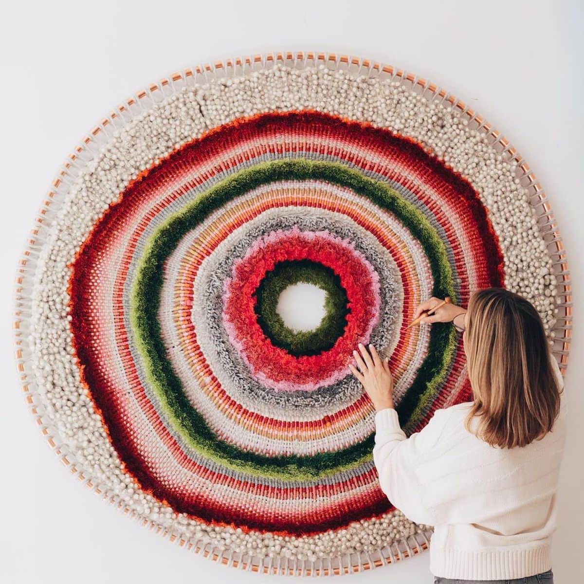 Artist Tammy Kanat creates large-scale woven wall hangings full of colors