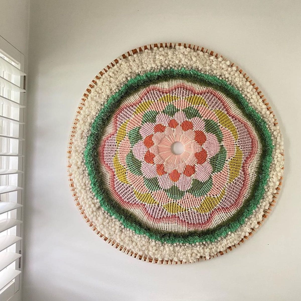 Artist Tammy Kanat creates large-scale woven wall hangings full of colors