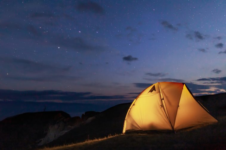 dome tent on mountain at night