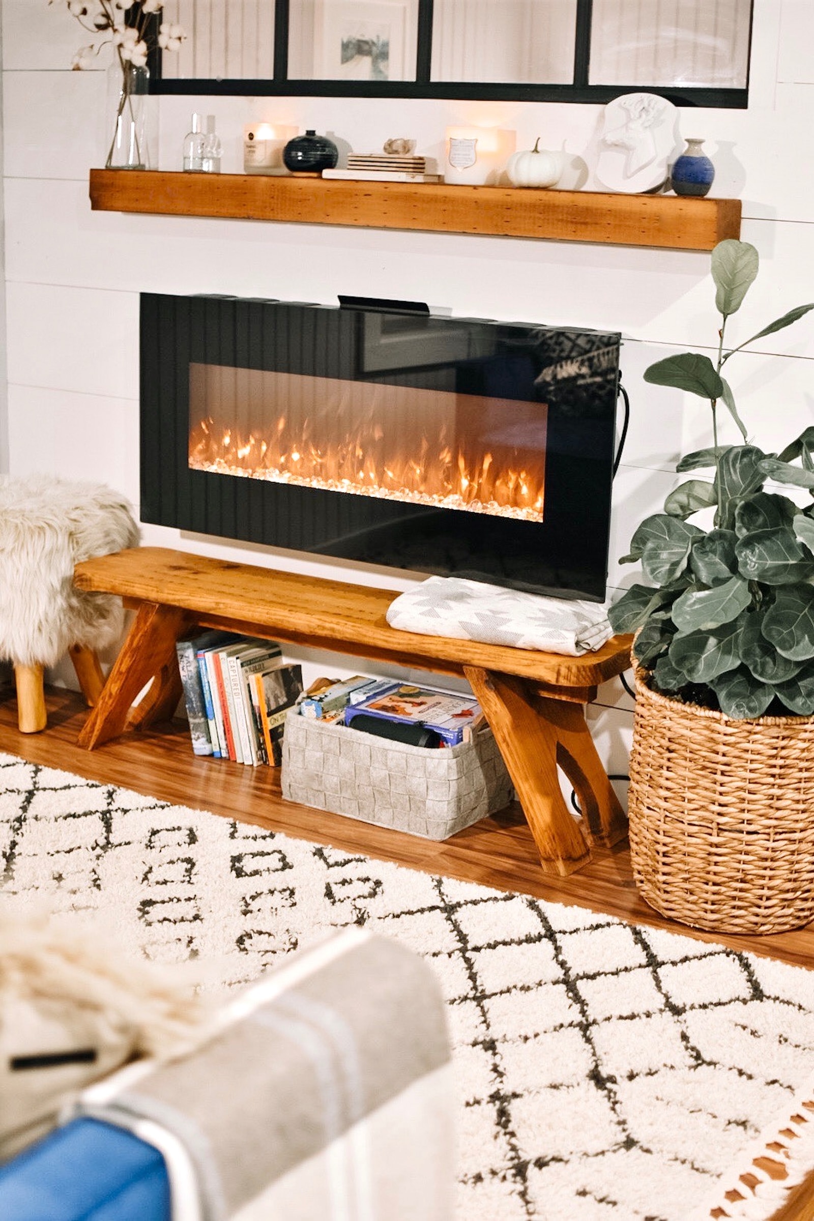 Use these Airbnb Interior Design tips to unlock your potential clients black flat screen tv turned on on brown wooden tv hutch