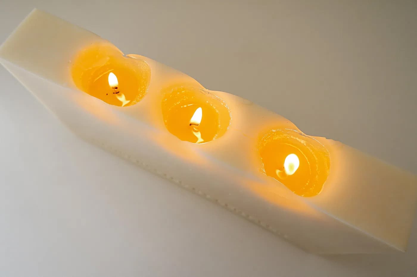 This hand-poured candle replicates the iconic JVC RC M90 boombox