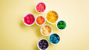 several cups of gummy candies