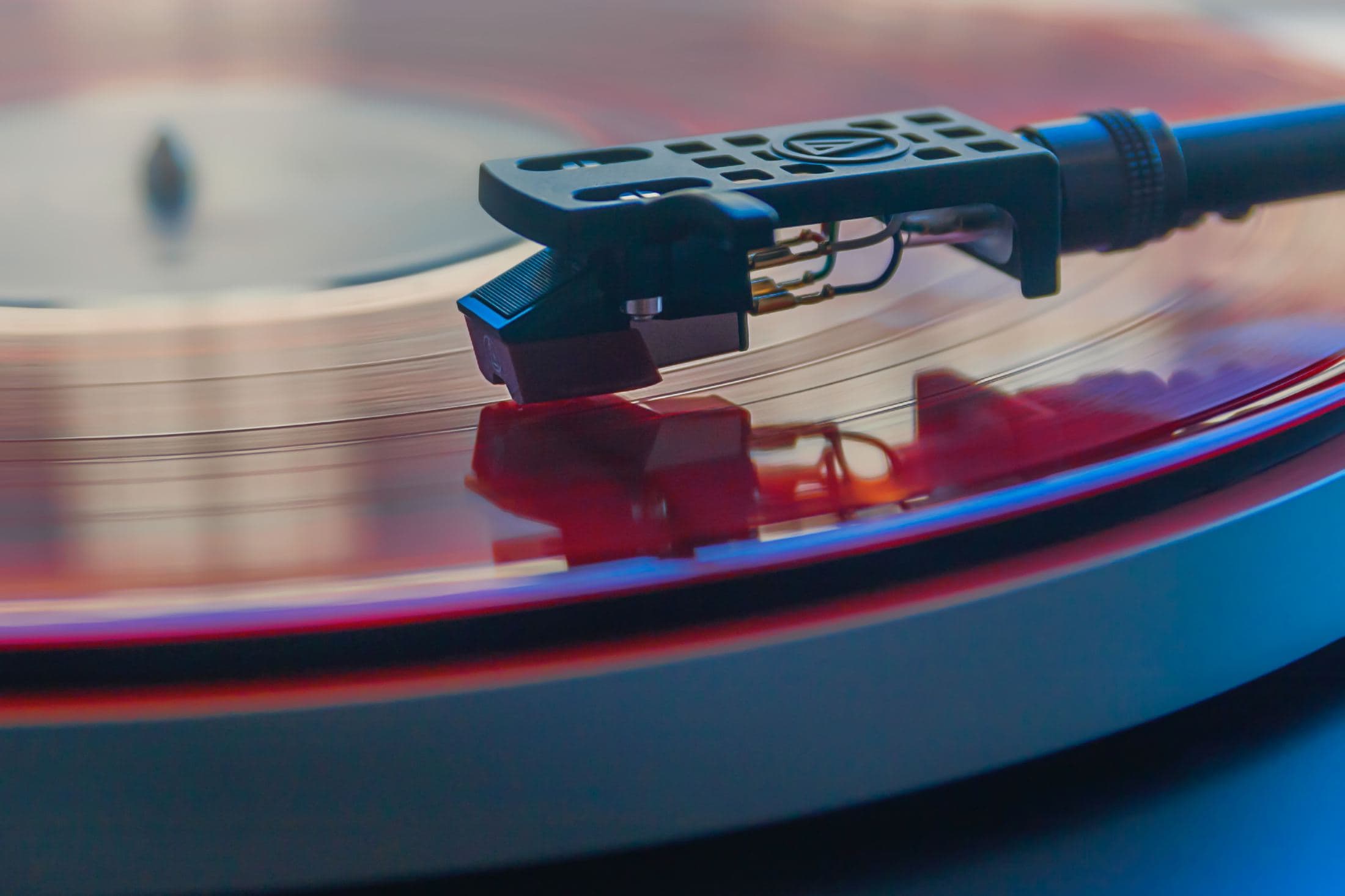 closeup photography of vinyl record in vinyl player